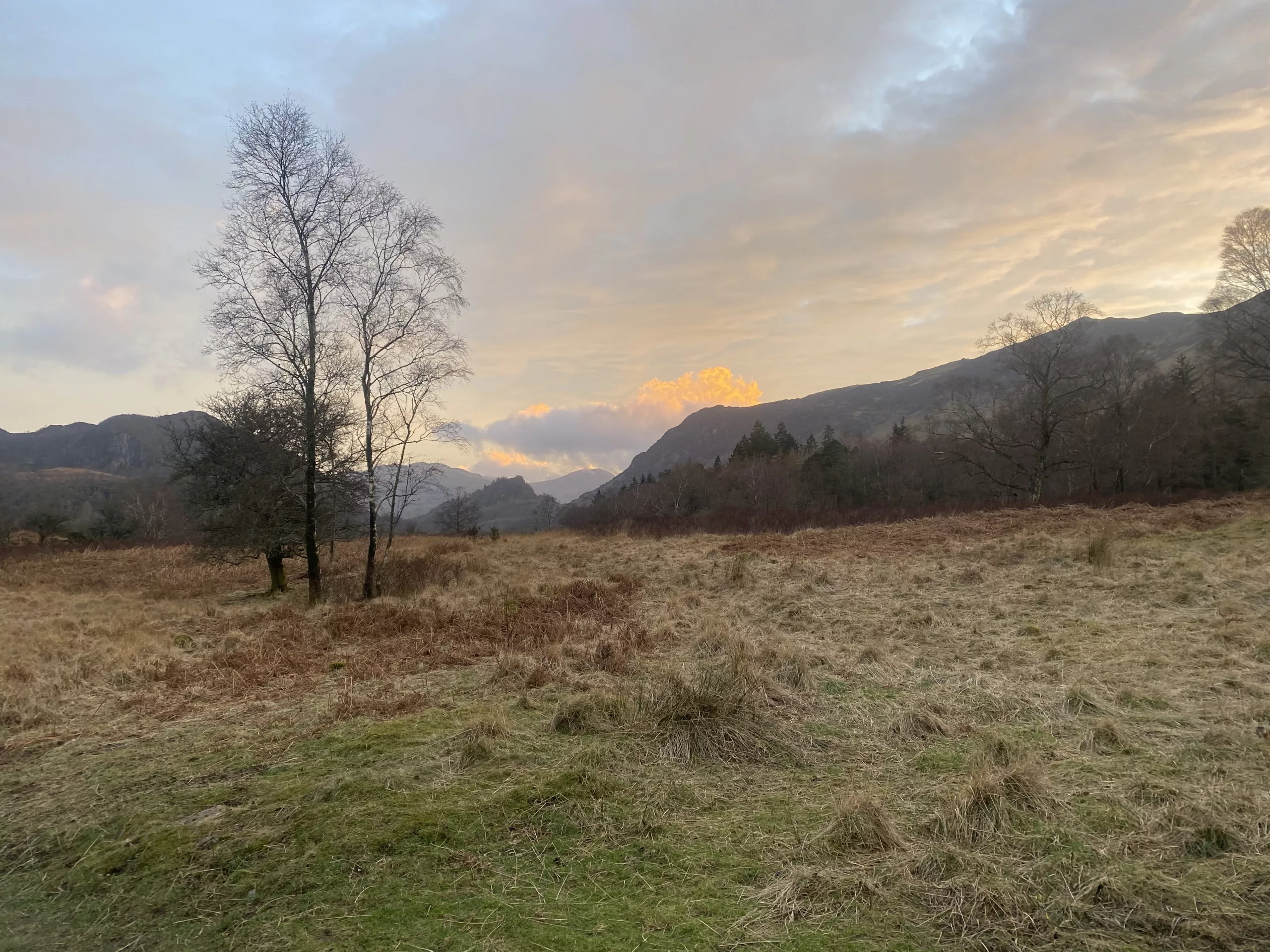 Picture of sun setting over mountains